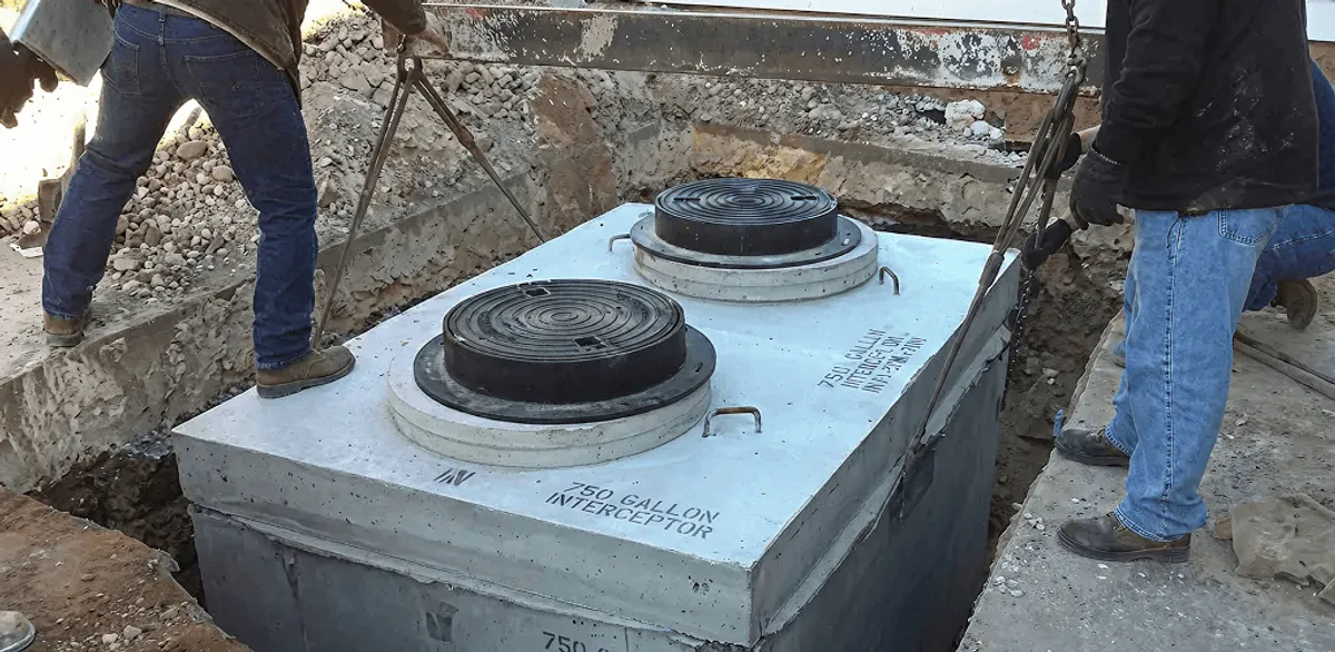 Grease trap installation for a commercial property drainage system in San Antonio, TX